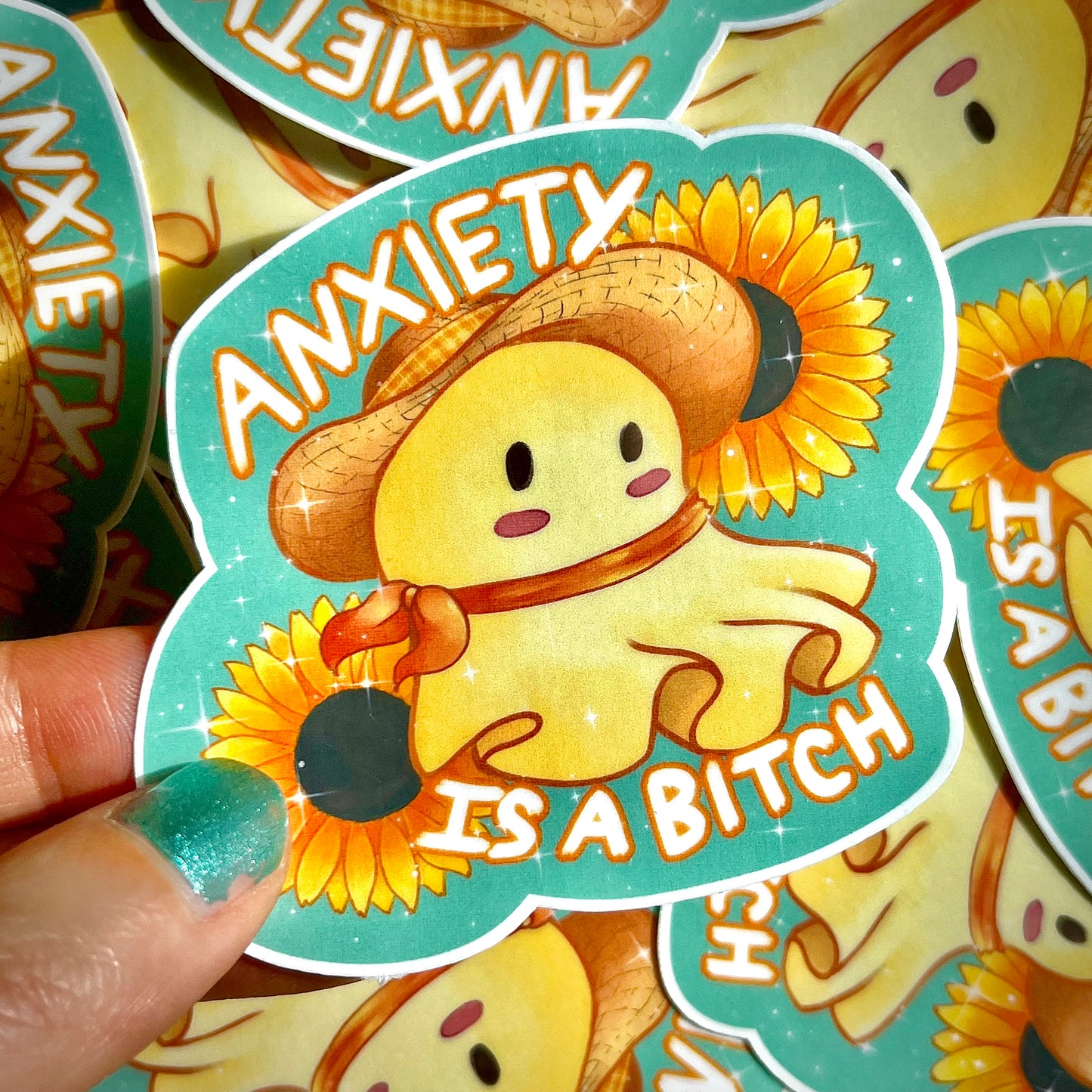 cute sunflower ghost sticker with the words "anxiety is a bitch" handmade sticker for sale
